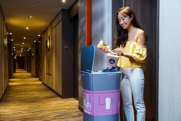 Room service is now delivered by robots at some hotels.